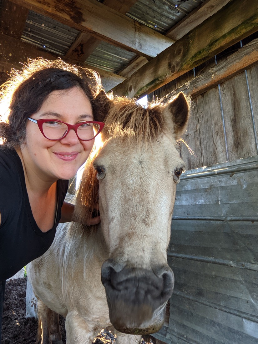 Brandie Lekovic with a horse